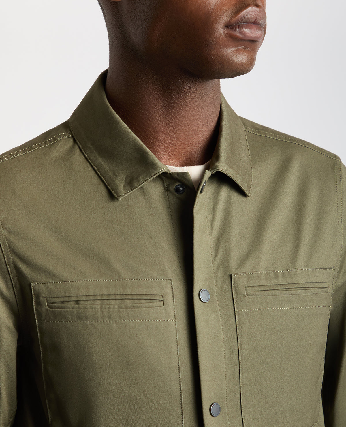 Man wearing a green Regular Fit Cotton Twill Utility Jacket