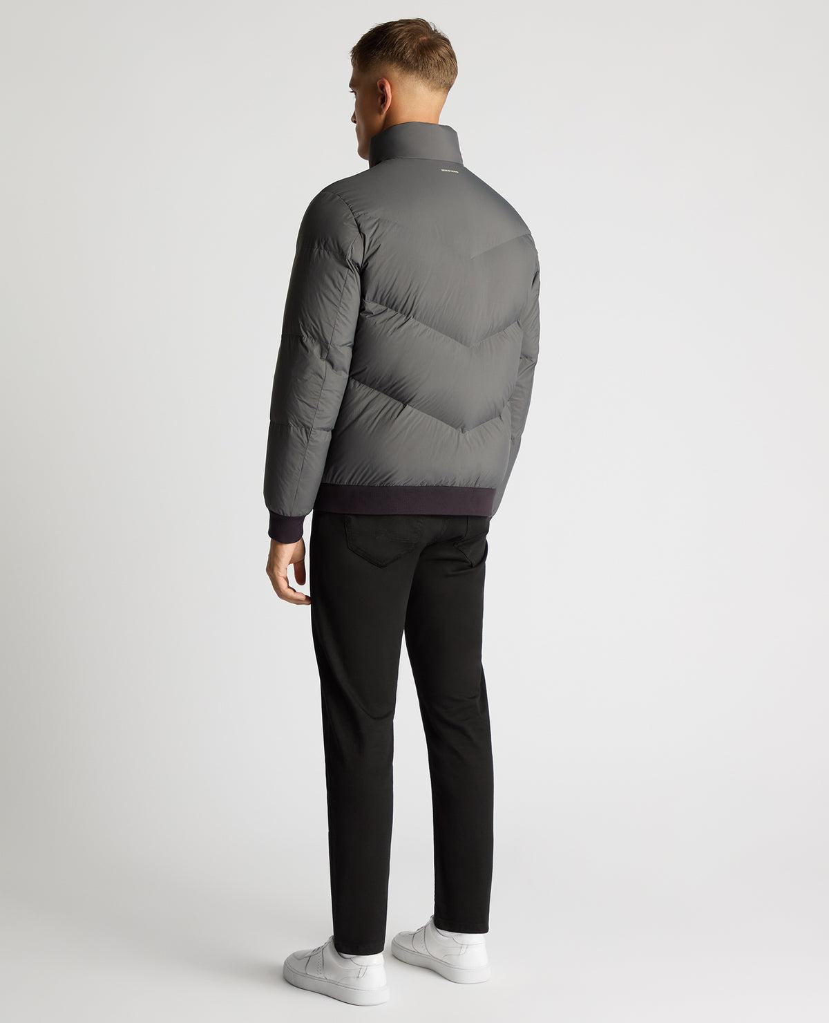 Man wearing a grey Regular Fit Down-Filled Quilted Jacket