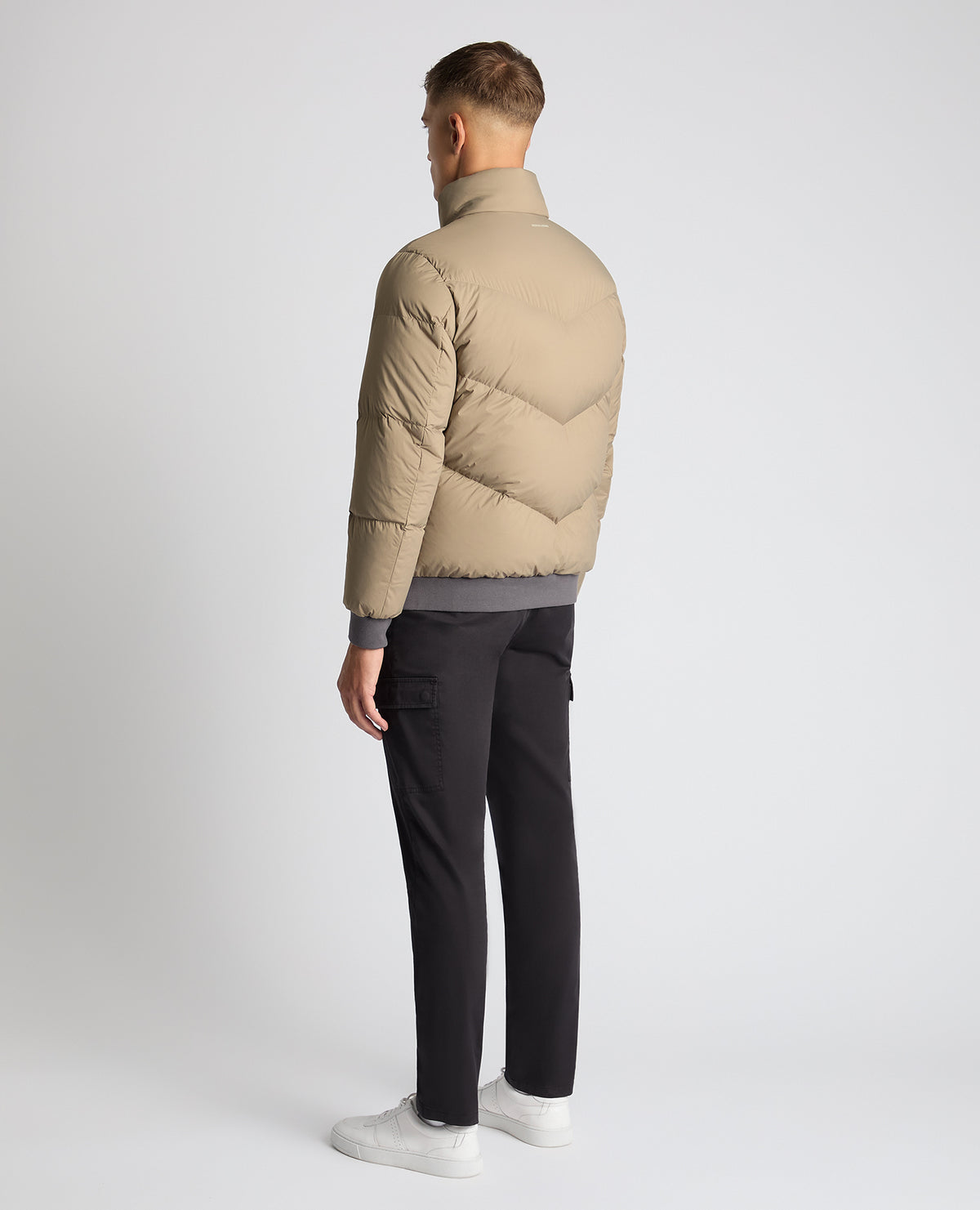 Man wearing a sand Regular Fit Down-Filled Quilted Jacket