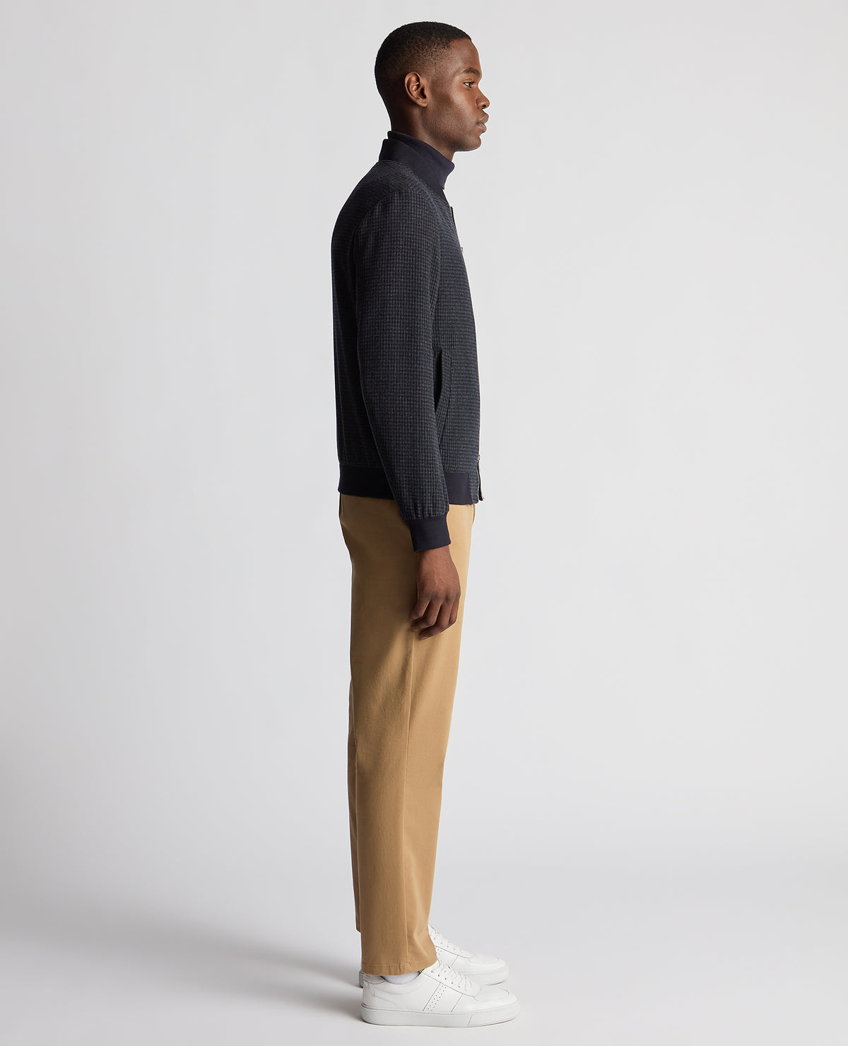 Man wearing a navy Regular Fit Club Check Flannel Bomber Jacket