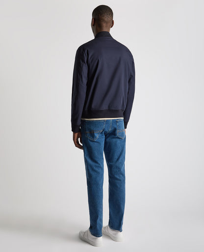 Man wearing a navy Regular Fit Showerproof Bomber Jacket