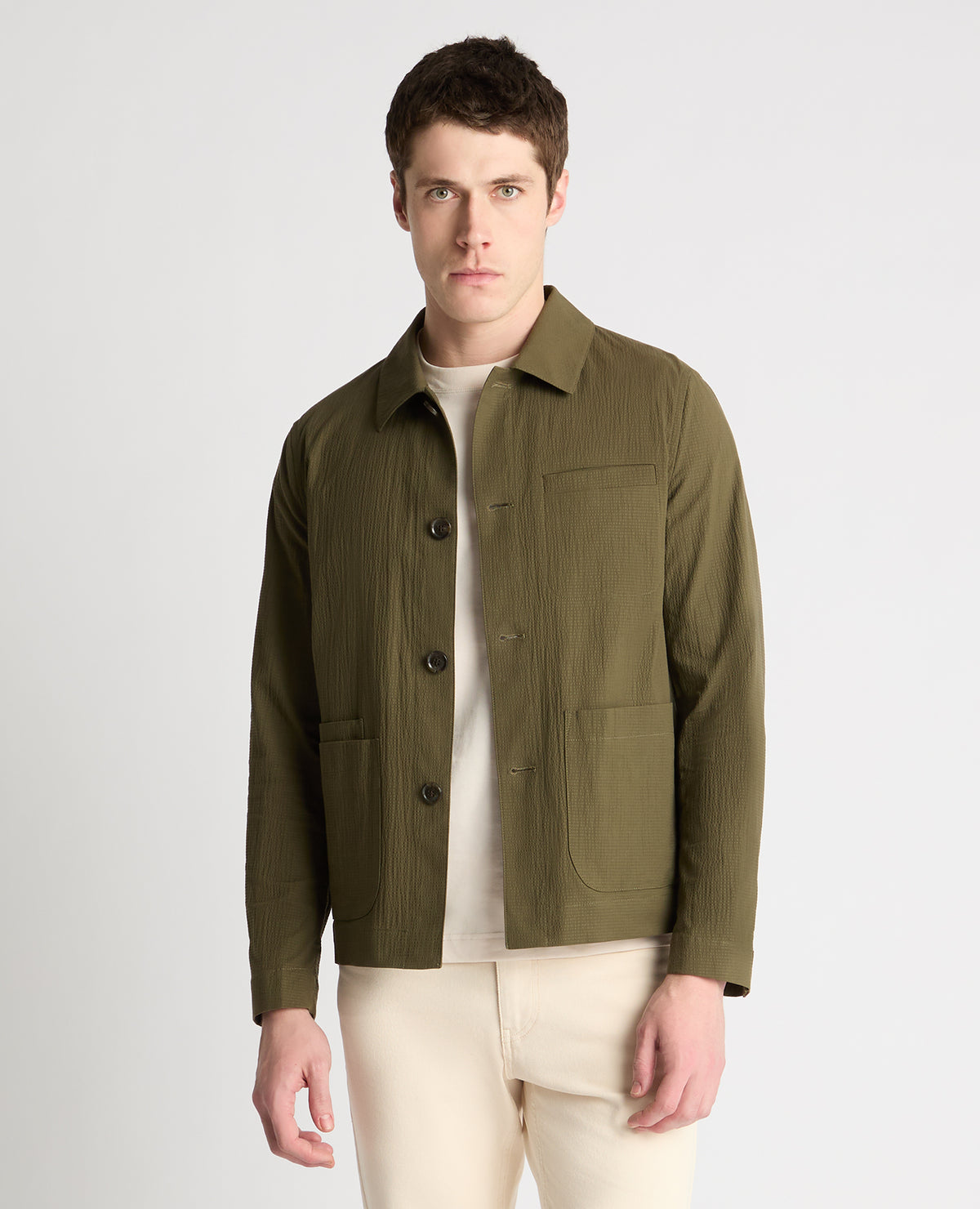 Man wearing a green jacket
