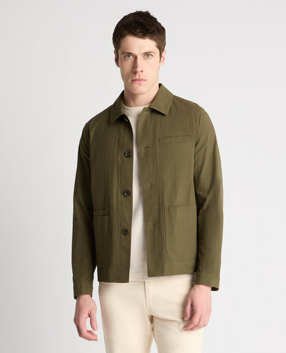 Man wearing a green jacket