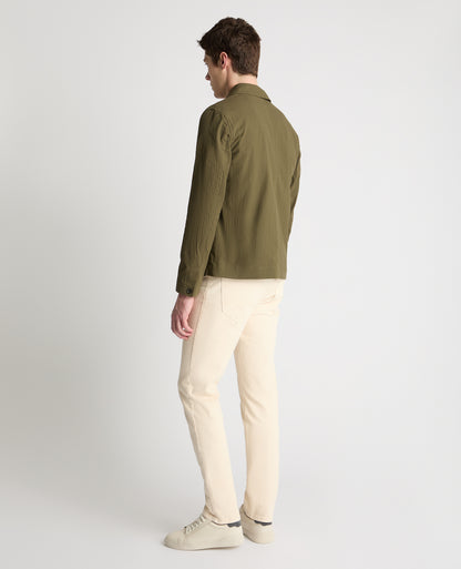 Man wearing a green jacket