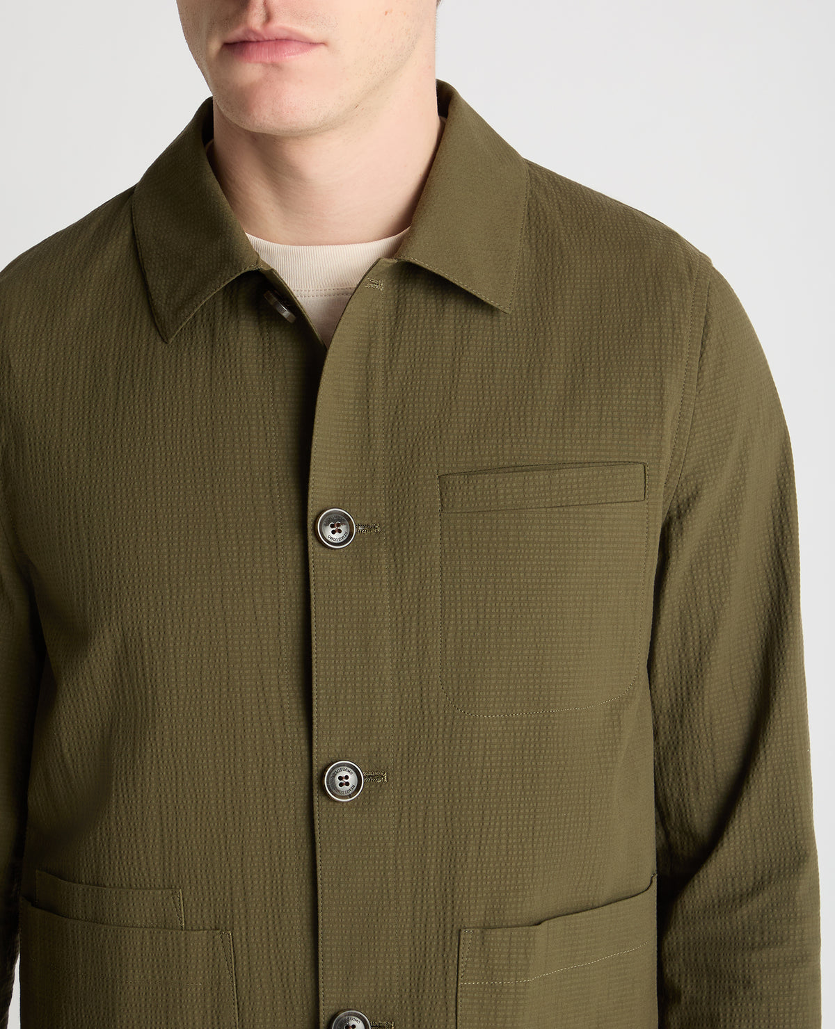 Man wearing a green jacket