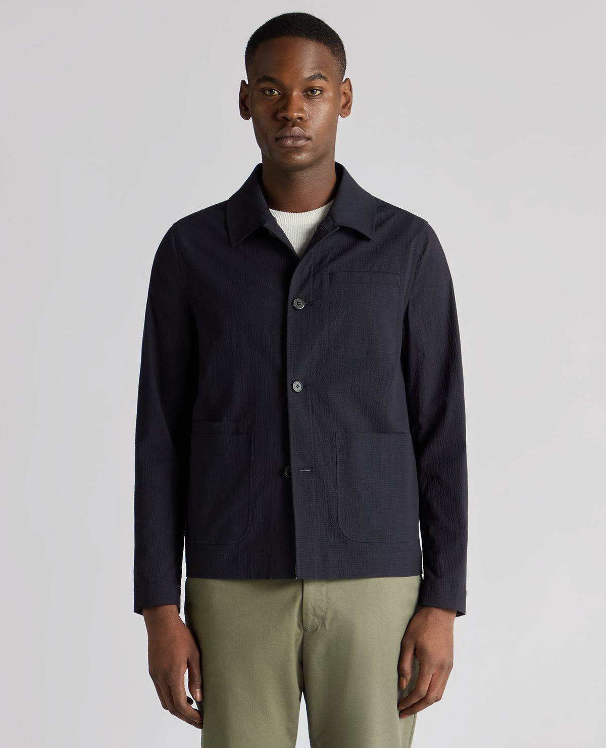 Man wearing a navy Regular Fit Chore Jacket