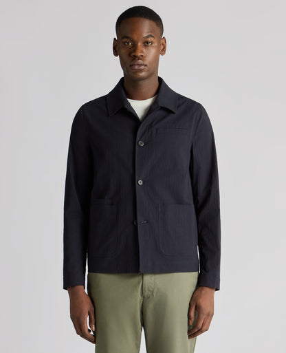 Man wearing a navy Regular Fit Chore Jacket