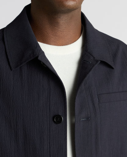 Man wearing a navy Regular Fit Chore Jacket