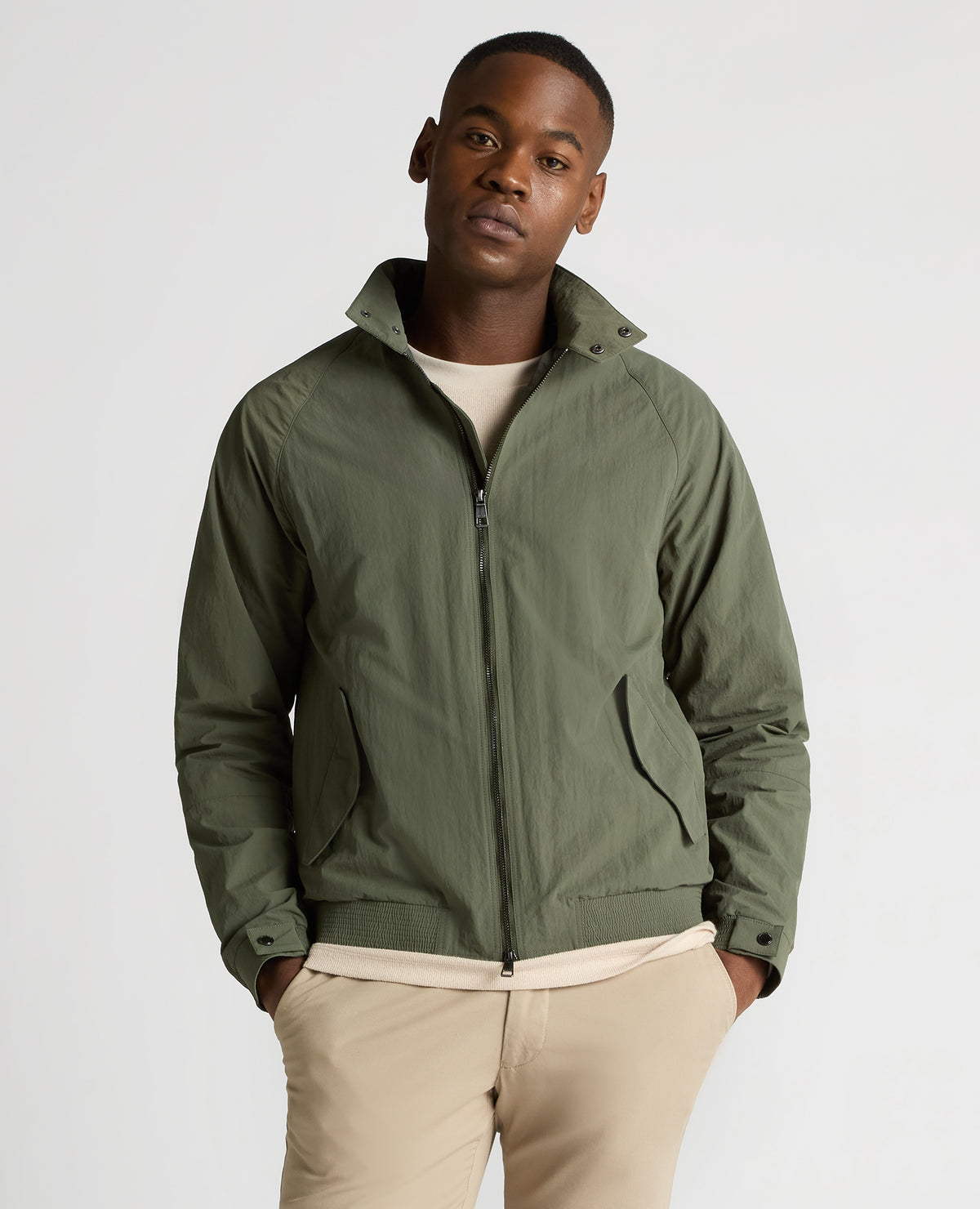 Man wearing a green Regular Fit Showerproof Harrington Jacket