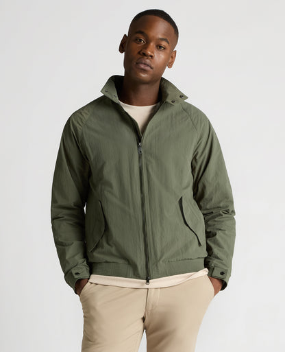 Man wearing a green Regular Fit Showerproof Harrington Jacket
