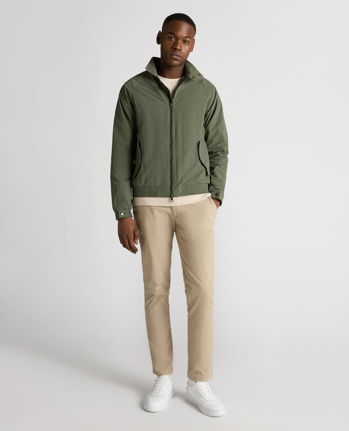 Man wearing a green Regular Fit Showerproof Harrington Jacket