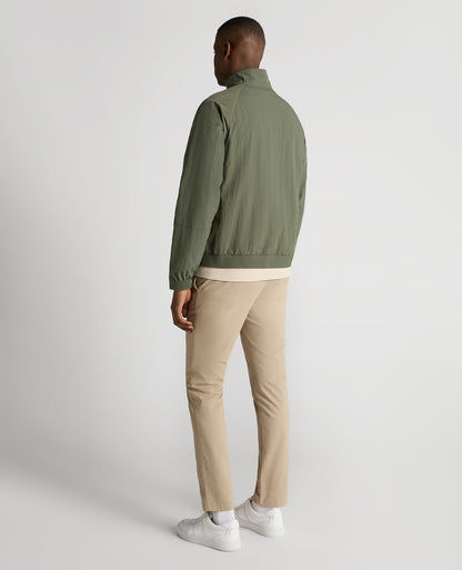 Man wearing a green Regular Fit Showerproof Harrington Jacket