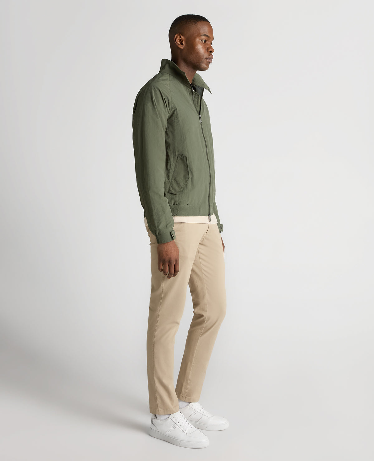Man wearing a green Regular Fit Showerproof Harrington Jacket