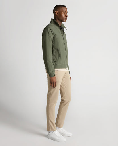 Man wearing a green Regular Fit Showerproof Harrington Jacket
