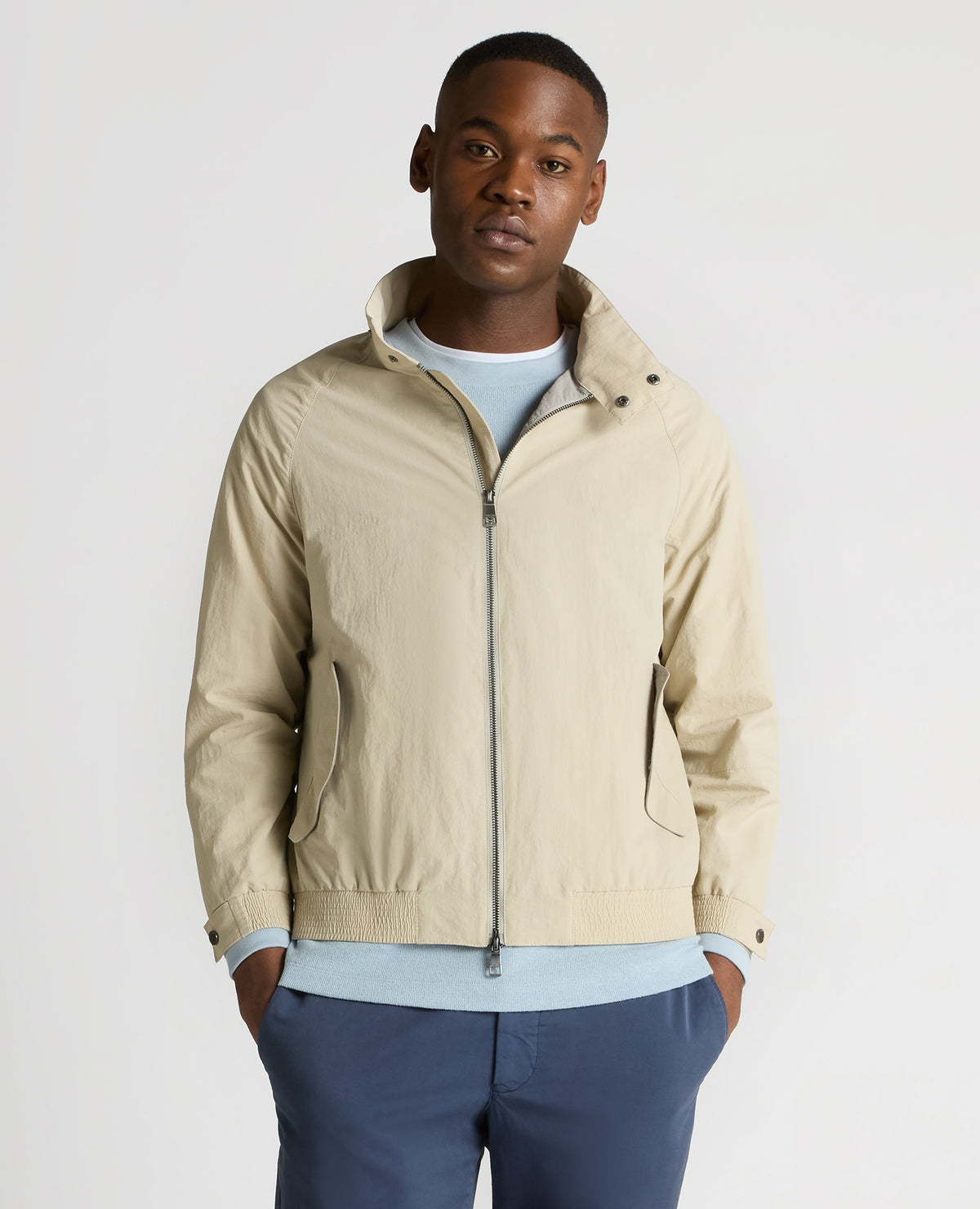 Man wearing a sand Regular Fit Showerproof Harrington Jacket
