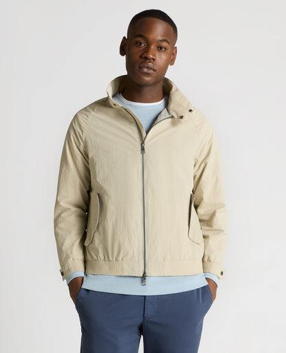 Man wearing a sand Regular Fit Showerproof Harrington Jacket