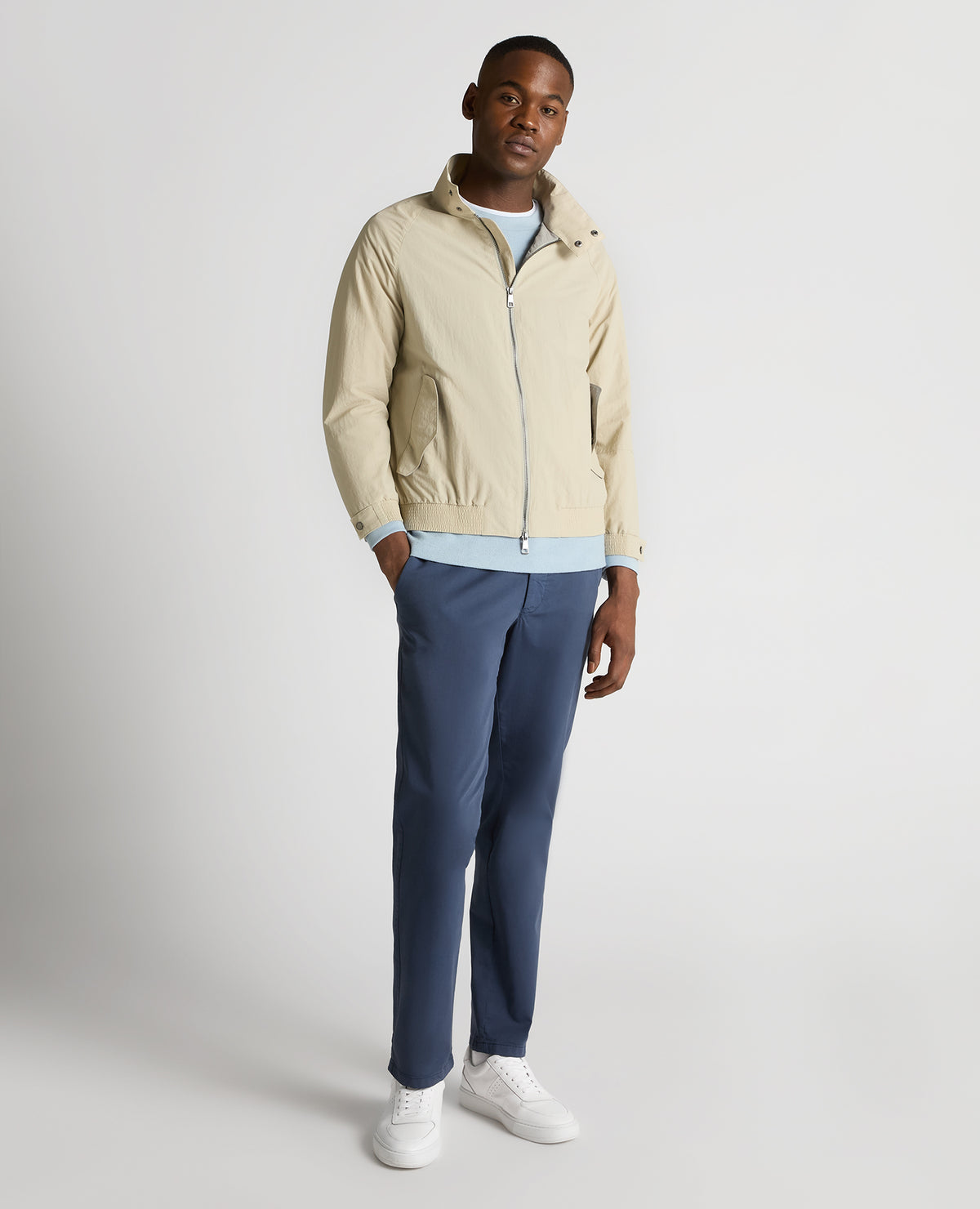 Man wearing a sand Regular Fit Showerproof Harrington Jacket