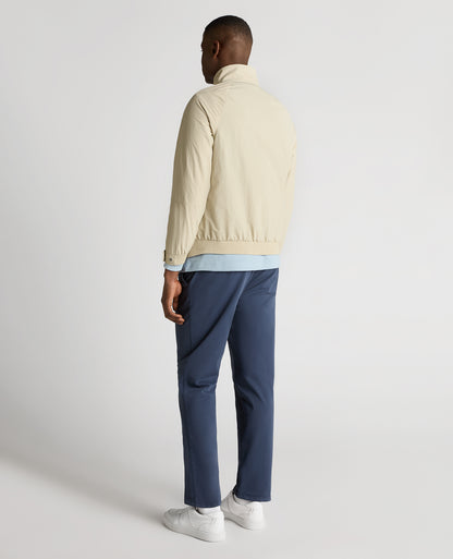 Man wearing a sand Regular Fit Showerproof Harrington Jacket