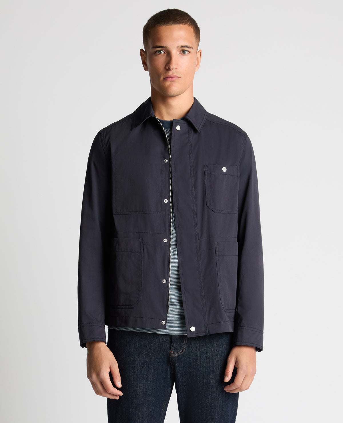 Man wearing a navy Regular Fit Cotton Twill Chore Jacket
