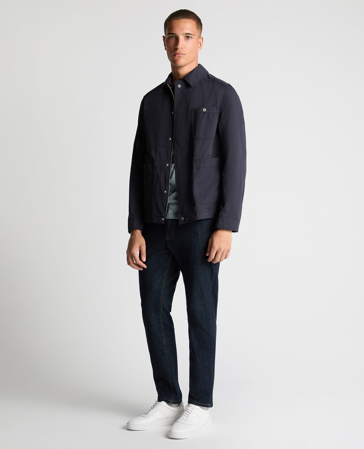 Man wearing a navy Regular Fit Cotton Twill Chore Jacket
