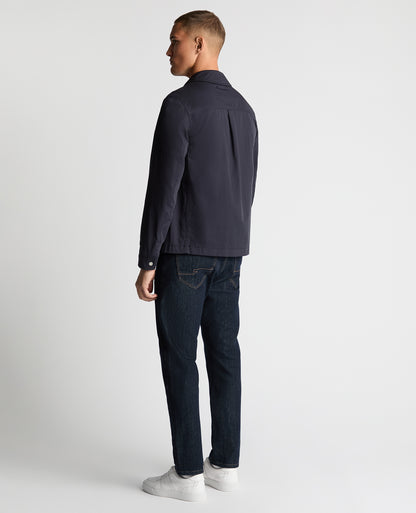 Man wearing a navy Regular Fit Cotton Twill Chore Jacket