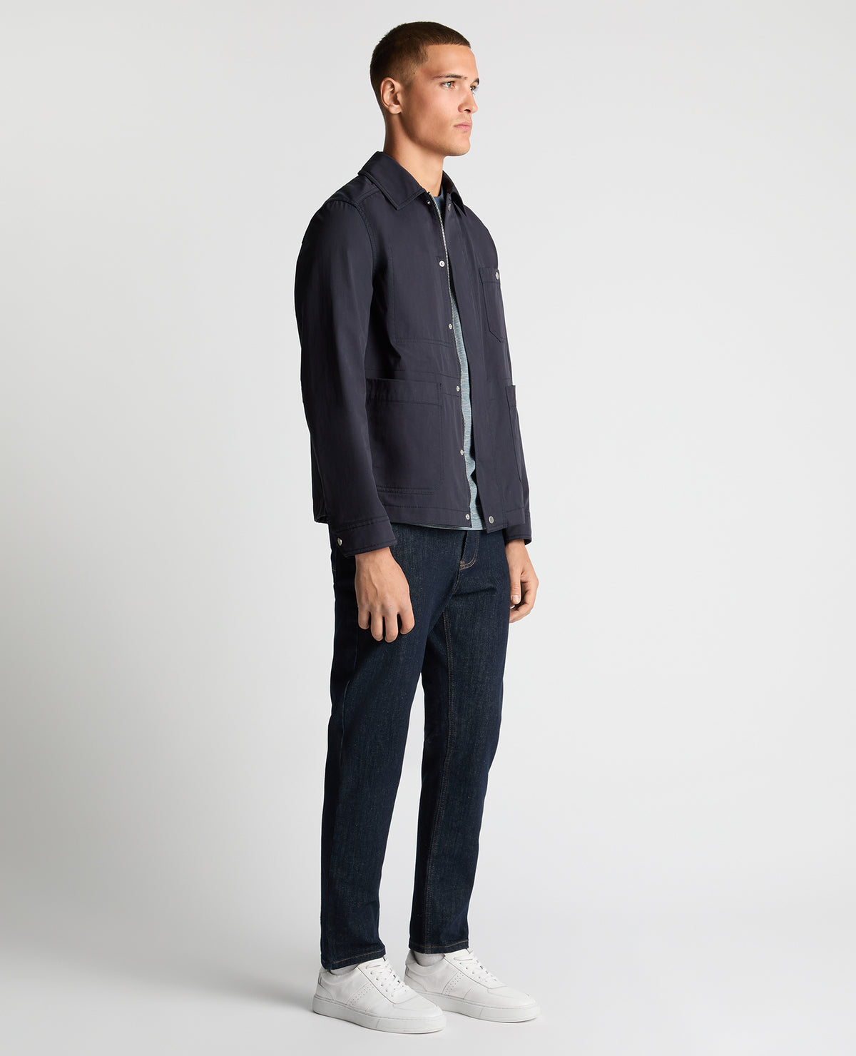 Man wearing a navy Regular Fit Cotton Twill Chore Jacket