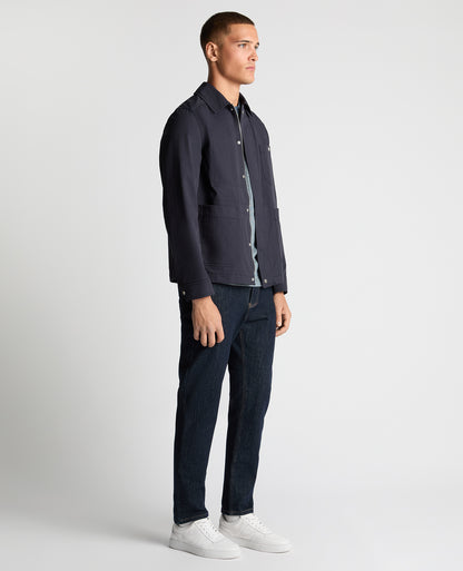 Man wearing a navy Regular Fit Cotton Twill Chore Jacket