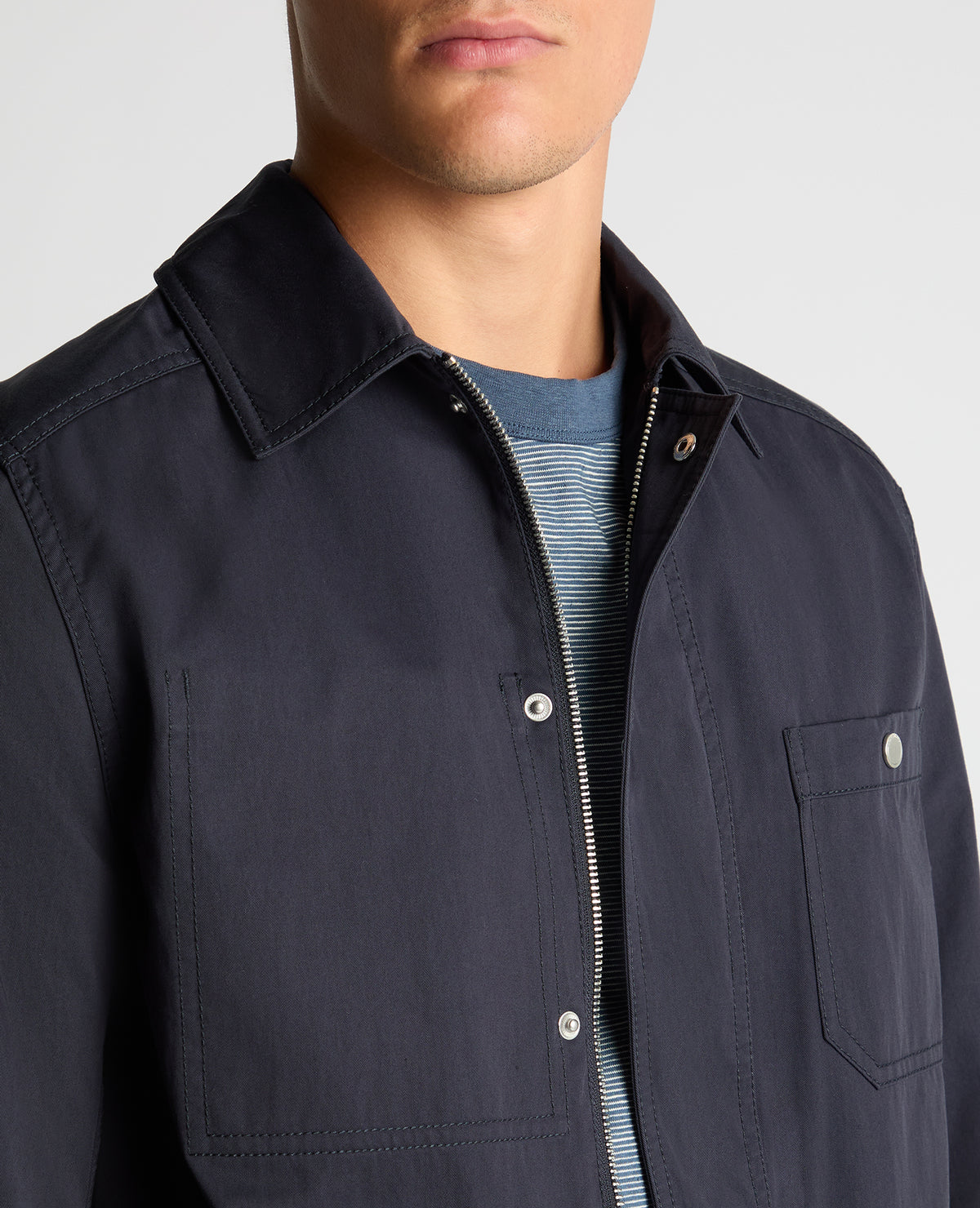 Man wearing a navy Regular Fit Cotton Twill Chore Jacket
