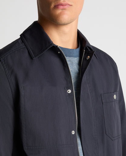 Man wearing a navy Regular Fit Cotton Twill Chore Jacket