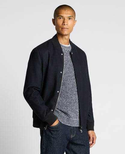 Man wearing a navy Wool-Blend Bomber Jacket