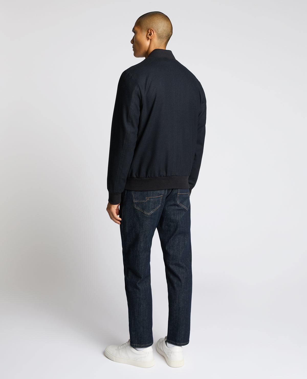 Man wearing a navy Wool-Blend Bomber Jacket