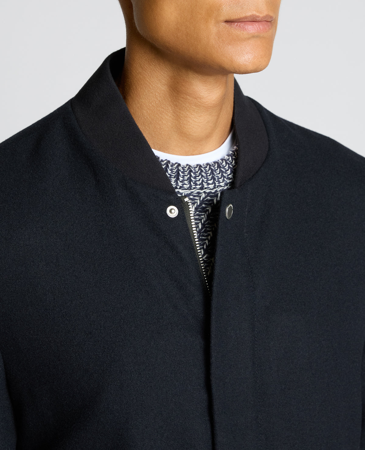 Man wearing a navy Wool-Blend Bomber Jacket