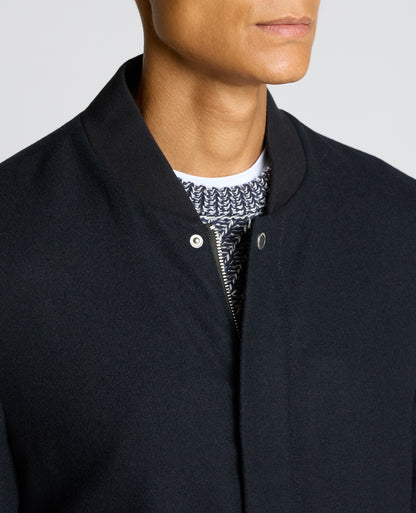 Man wearing a navy Wool-Blend Bomber Jacket