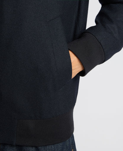 Man wearing a navy Wool-Blend Bomber Jacket