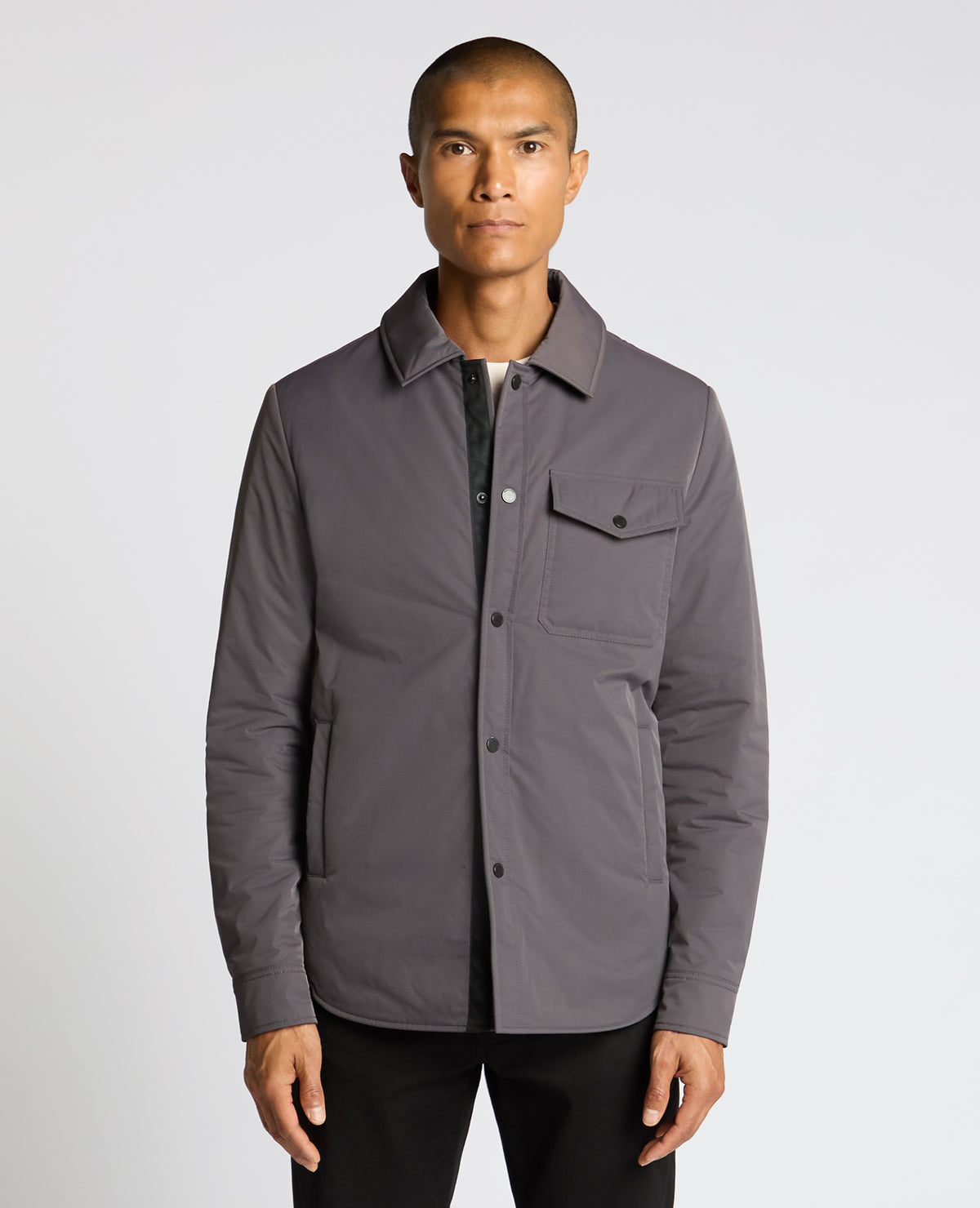 Man wearing a grey Padded Button-Up Jacket