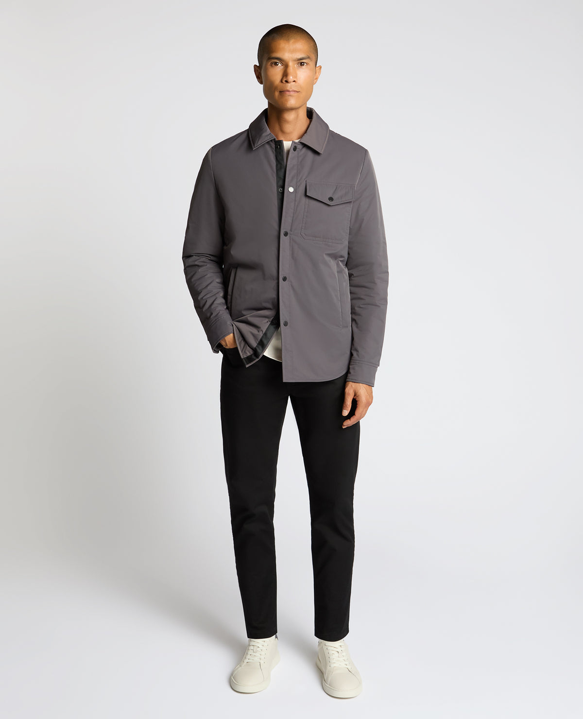 Man wearing a grey Padded Button-Up Jacket