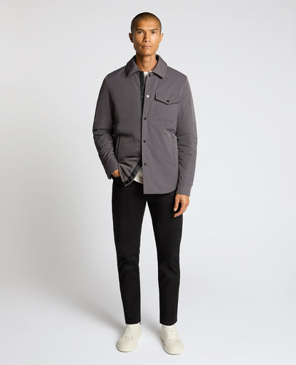 Man wearing a grey Padded Button-Up Jacket