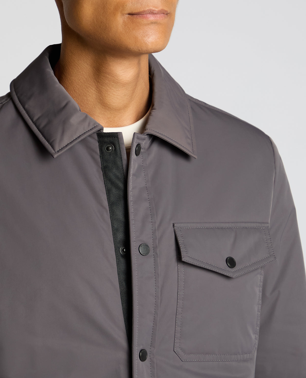Man wearing a grey Padded Button-Up Jacket