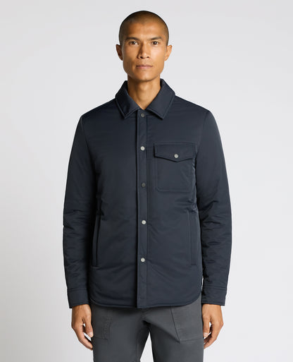 Man wearing a navy Padded Button-Up Jacket