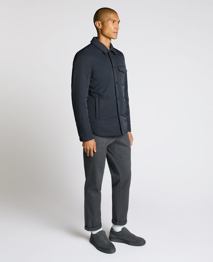 Man wearing a navy Padded Button-Up Jacket