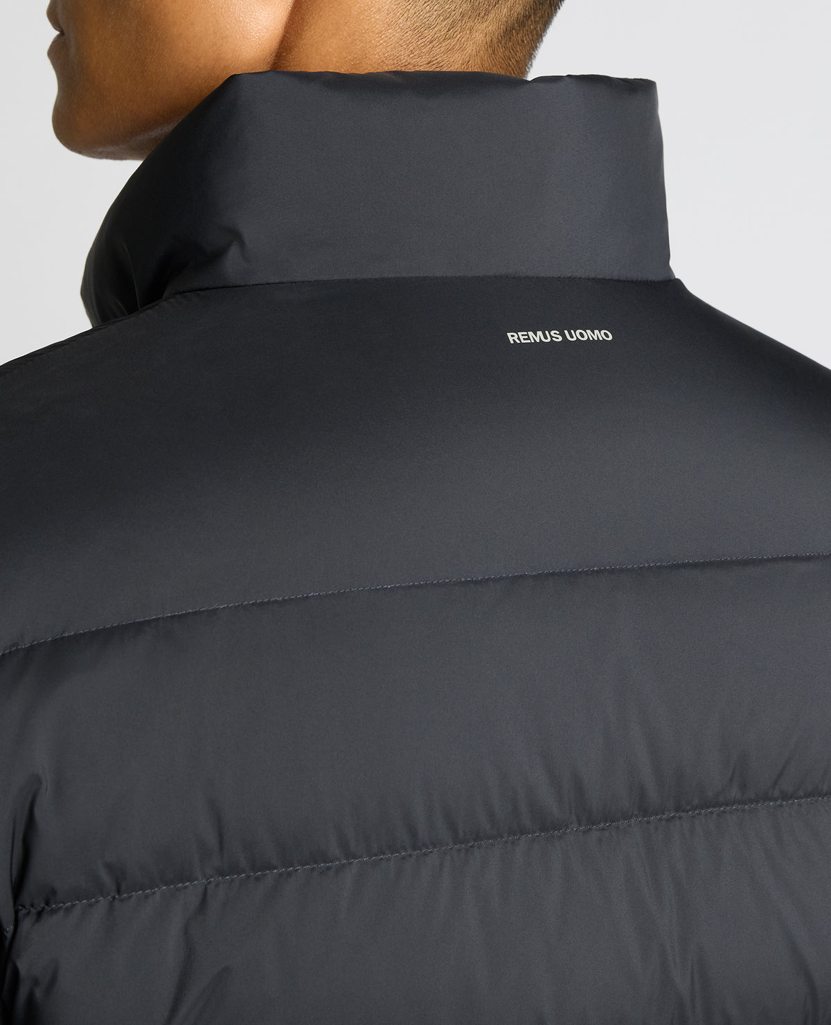 Man wearing a navy Regular Fit Quilted Jacket