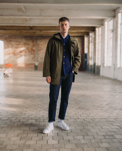 Man wearing a green jacket