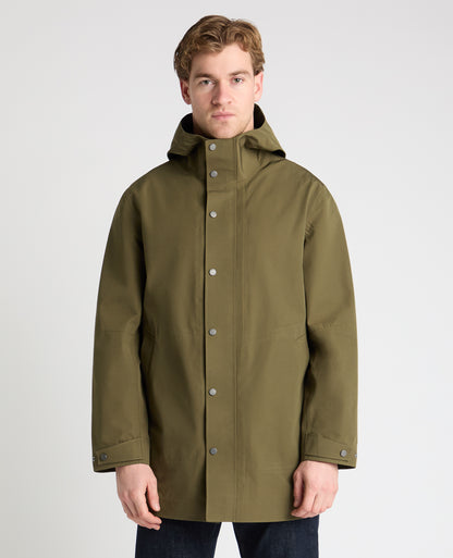 Man wearing a green jacket