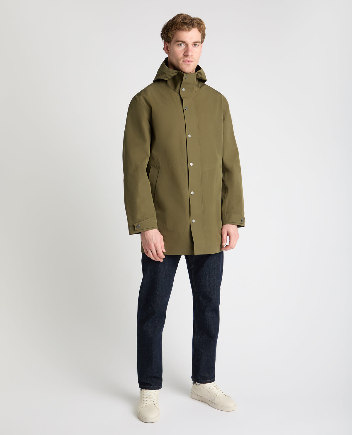 Man wearing a green jacket