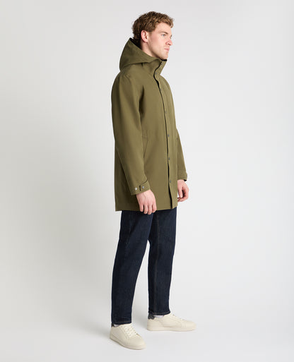 Man wearing a green jacket