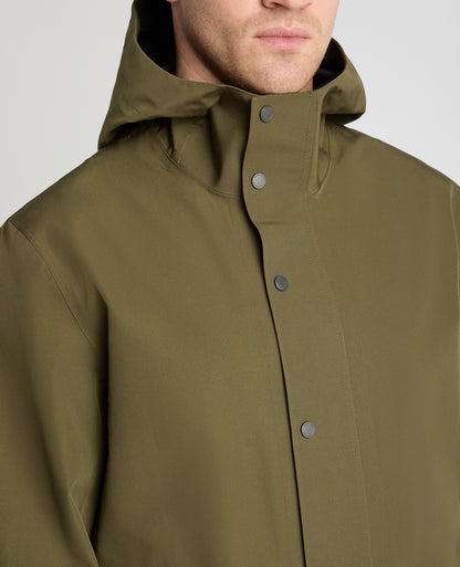 Man wearing a green jacket