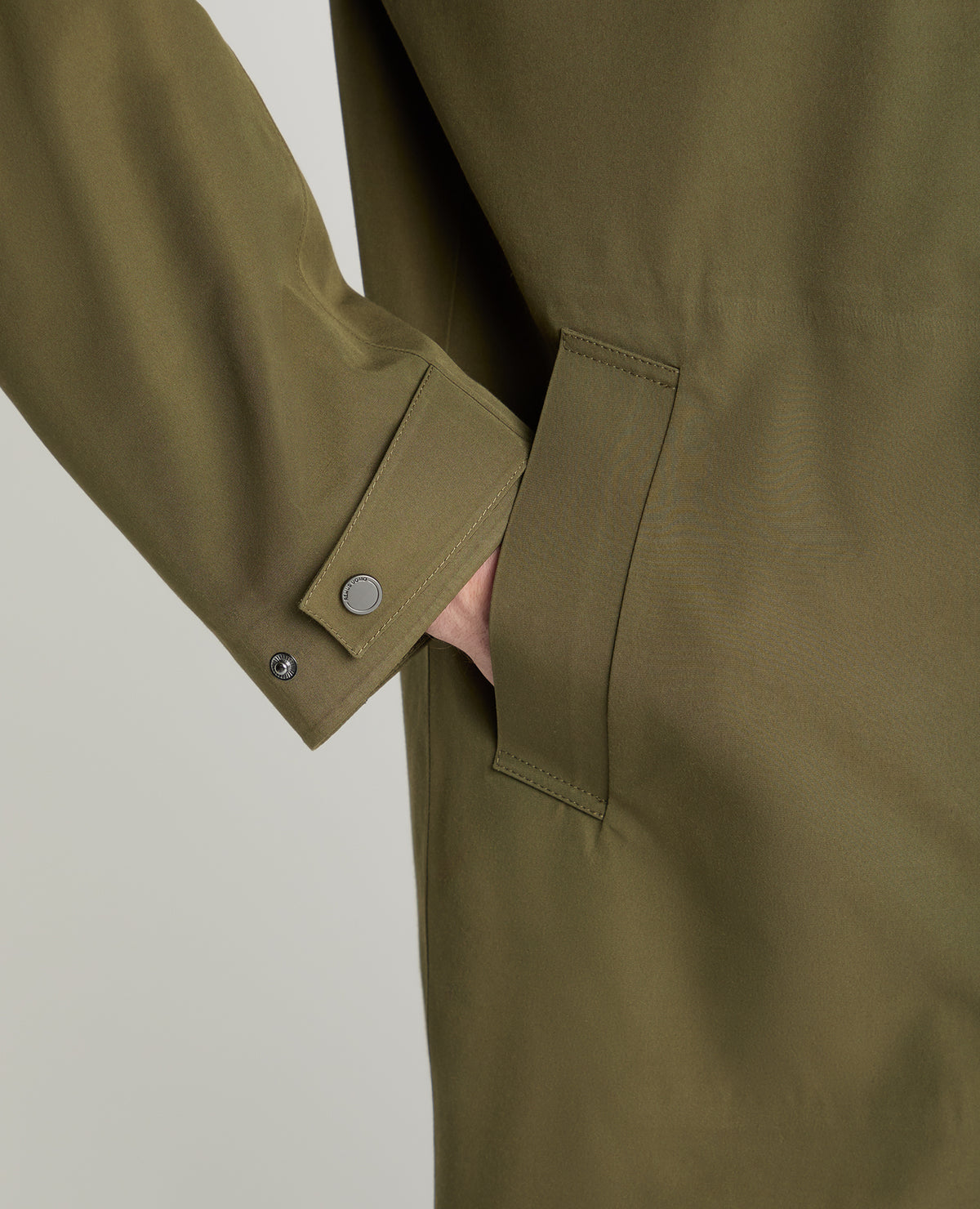 Man wearing a green jacket