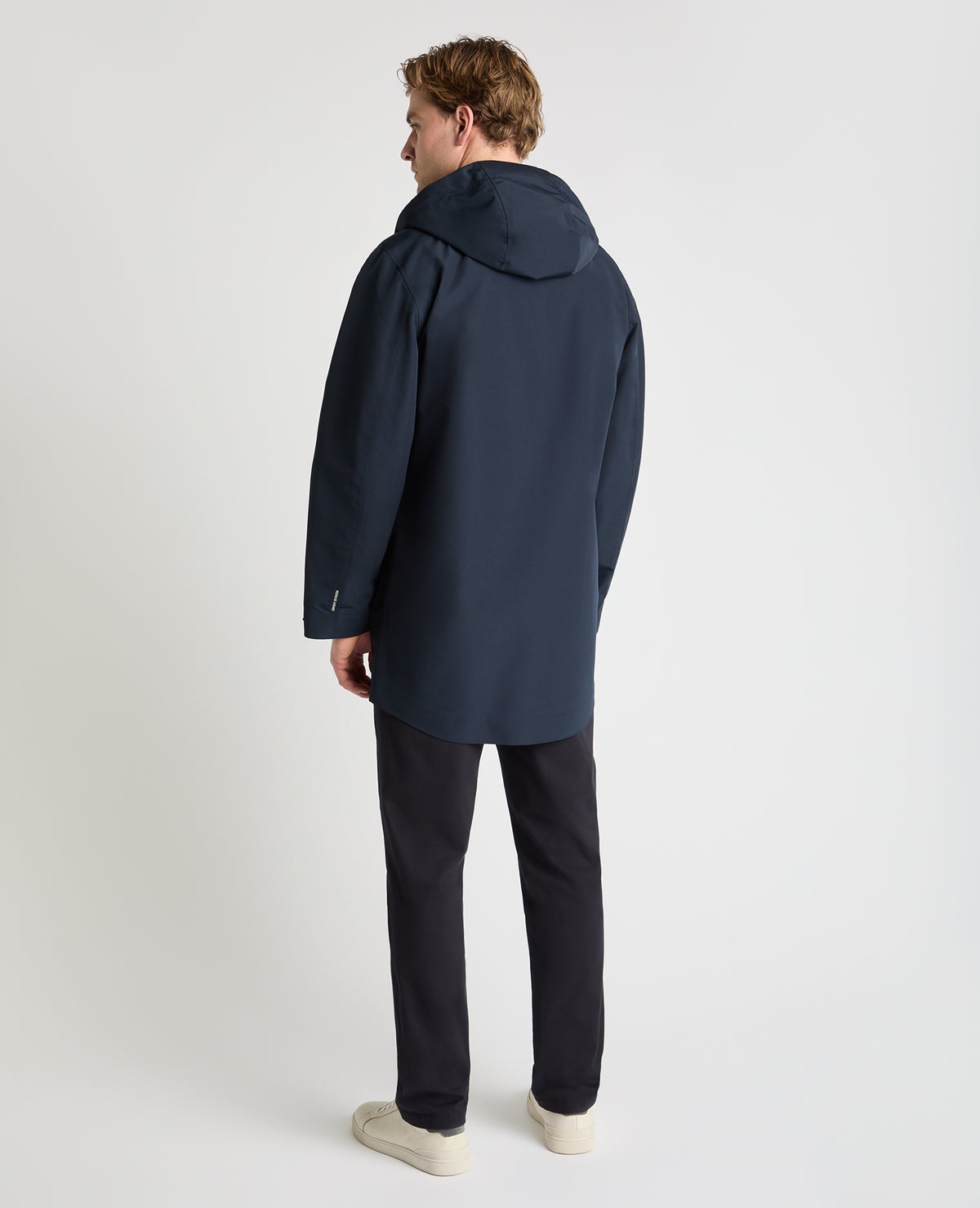 Man wearing a navy jacket