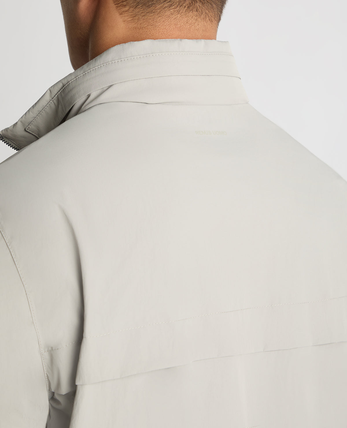 Man wearing a Grey jacket
