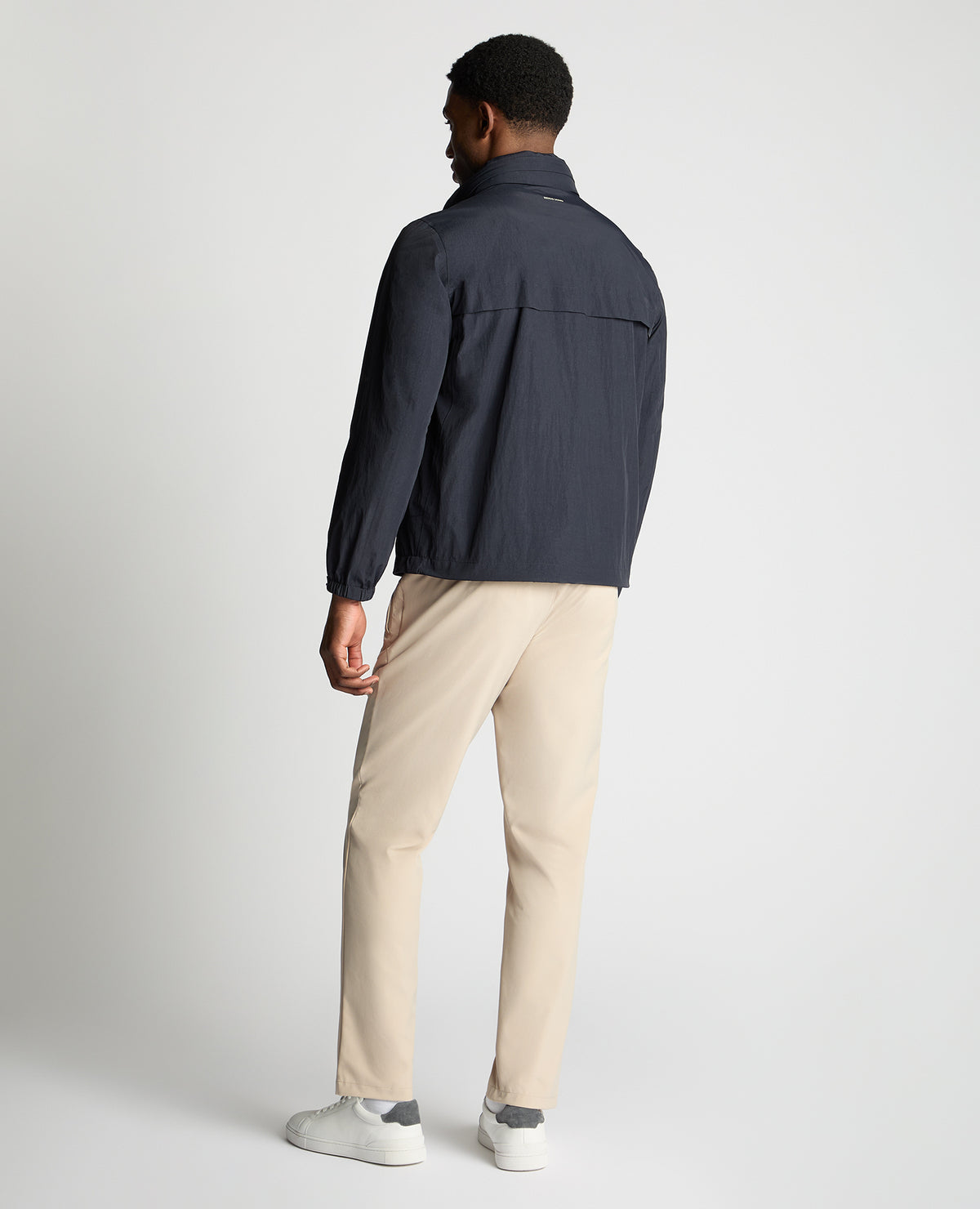 Man wearing a navy jacket